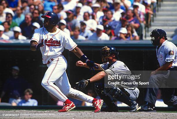 Albert Belle of the Cleveland Indians bats against the Chicago White Sox during an Major League Baseball game circa 1994 at Cleveland Stadium in...