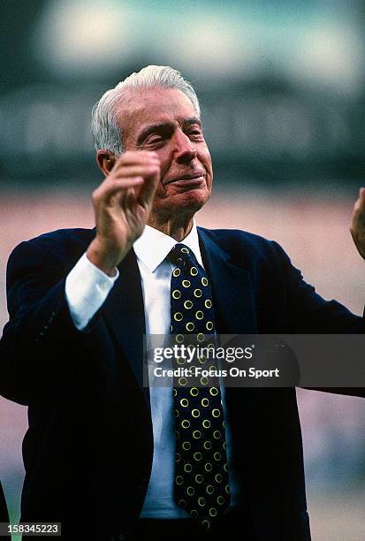 New York Yankee great, Joe DiMaggio looks on before an Major League Baseball game circa 1994 at Yankee Stadium in the Bronx borough of New York City....