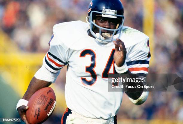 Running back Walter Payton of the Chicago Bears carries the ball during an NFL football game circa 1980. Payton played for the Bears from 1975-87.