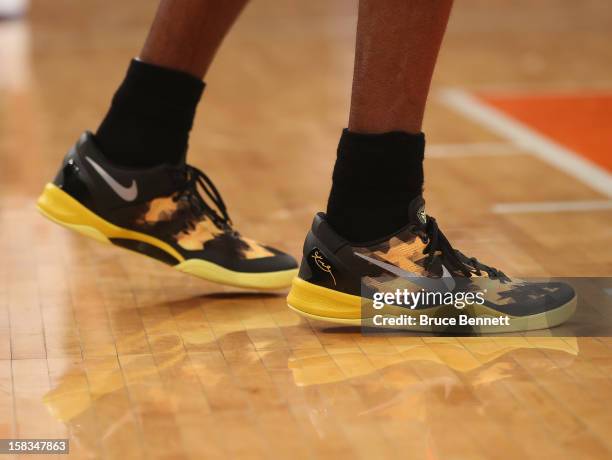 Kobe Bryant of the Los Angeles Lakers premieres the new Kobe 8 shoe by Nike in the game against the New York Knicks at Madison Square Garden on...