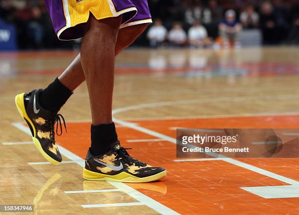 Kobe Bryant of the Los Angeles Lakers premieres the new Kobe 8 shoe by Nike in the game against the New York Knicks at Madison Square Garden on...