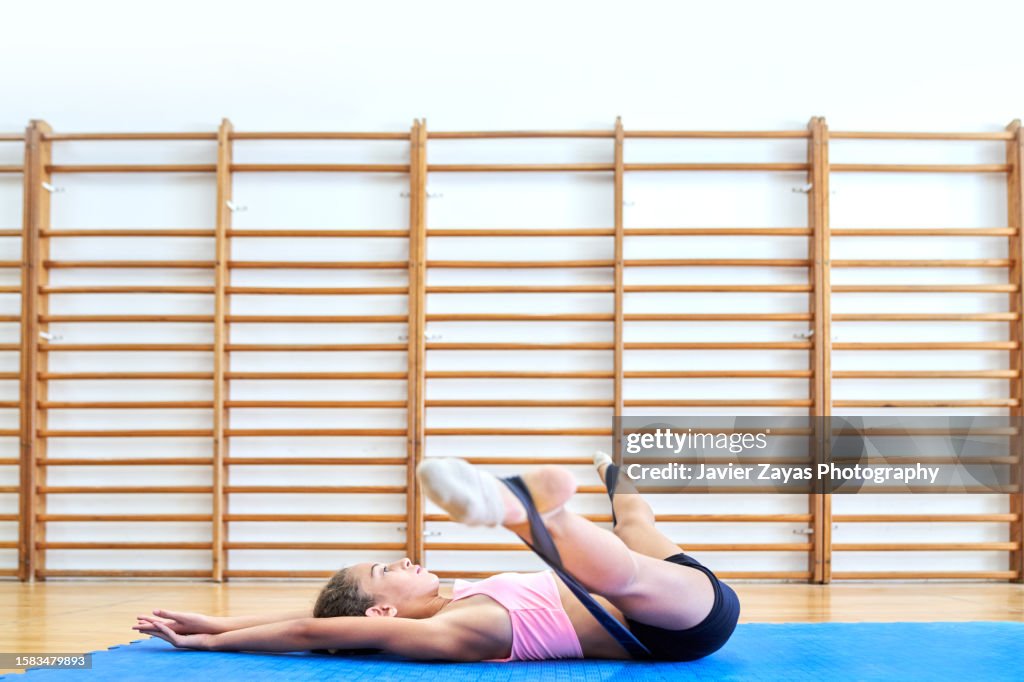 Gymnast Girl Stretching Before Starting A Rhythmic Gymnastics Training ...