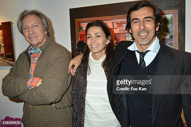 Long Chris, his daughter Adeline Blondieau and Laurent Hubert attend the 'Amerique: Instantanes' - Laurent Hubert Painting Exhibition Preview at...