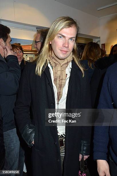 Christophe Guillarme attends the 'Amerique: Instantanes' - Laurent Hubert Painting Exhibition Preview at Galerie Myriane on December 13, 2012 in...