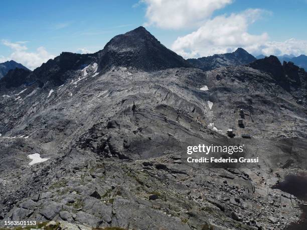 view of joderhorn and monte moro pass from monte moro - mountain pass stock pictures, royalty-free photos & images