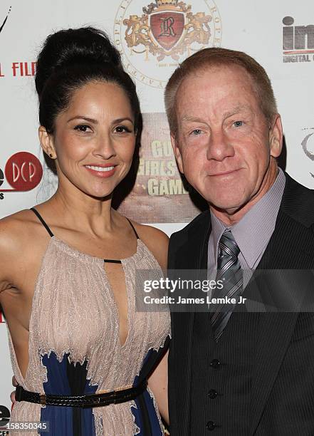 Milagros Peterson and Ron Peterson attend the Los Angeles Screening "Guns, Girls & Gambling" held at the Laemlle NoHo 7 on December 13, 2012 in North...