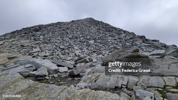 alpine scree at mt. joderhorn seen from monte moro pass - mountain pass stock pictures, royalty-free photos & images