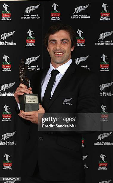 Conrad Smith poses with the Super Rugby Player of the Year award during the 2012 Steinlager Rugby Awards at SkyCity Convention Centre on December 14,...