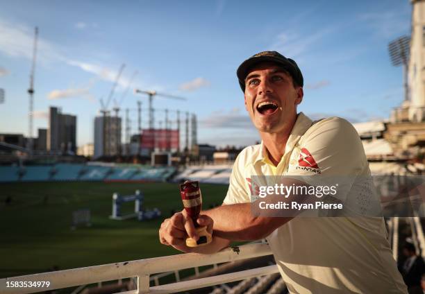 Pat Cummins of Australia poses with a replica Ashes Urn after Day Five of the LV= Insurance Ashes 5th Test match between England and Australia at The...