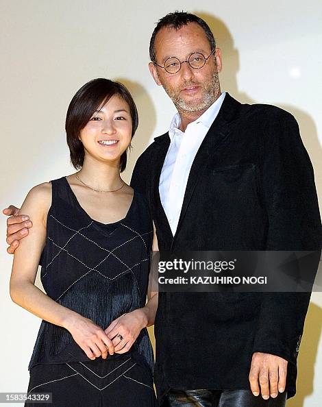 Anna Rioko French actor Jean Reno and Japanese actress Ryoko Hirosue pose for ...