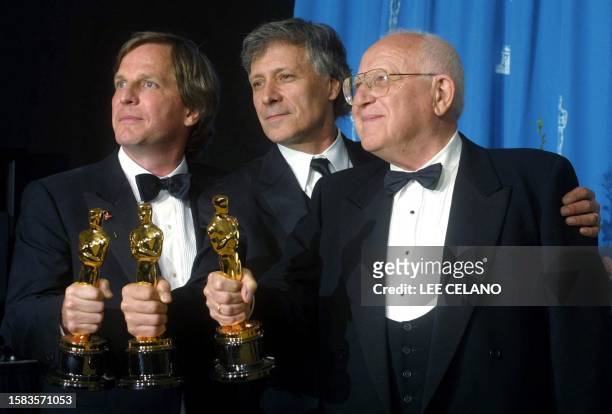 Producers Douglas Wick , David Franzoni and Branko Lustig hold their Oscars for Best Picture for "Gladiator" at the 73rd Annual Academy Awards at the...