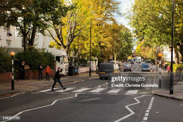 The famous Abbey Road zebra crossing near the Abbey Road Studios on October 19, 2012 in London, United Kingdom.