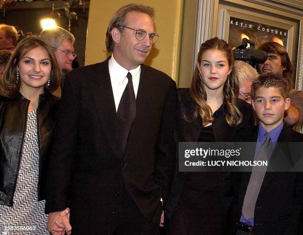 Actor Kevin Costner arrives at the premiere of his new film "Thirteen Days" about the 1962 Cuban missile crisis, with his daughter Annie , daughter...