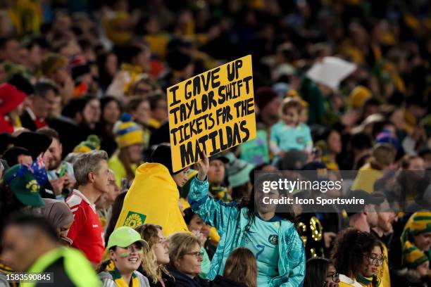 Australian fan holds up a sign during the Women's World Cup round of 16 football match between the Australia Matildas and Denmark at Stadium...