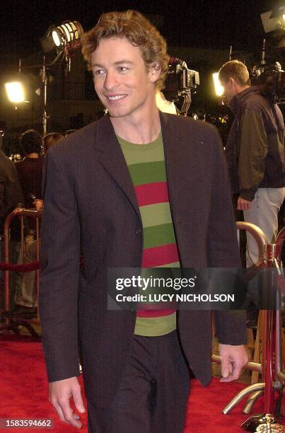 Actor Simon Baker arrives at the premiere of his new film "Red Planet" in Los Angeles, 6 November 2000. AFP PHOTO/Lucy Nicholson