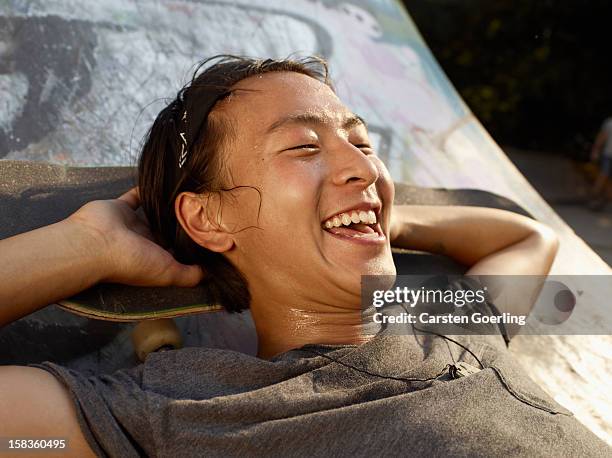 skater - boys laughing stock pictures, royalty-free photos & images