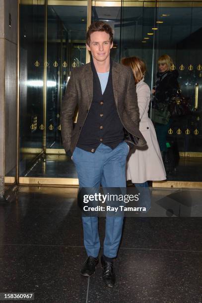 Actor Eddie Redmayne leaves the "Today Show" at the NBC Rockefeller Center Studios on December 13, 2012 in New York City.