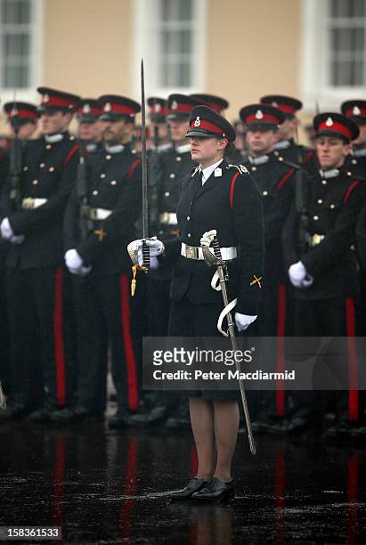Senior Under Officer Sarah Hunter-Choat stands with the Sword of Honour, awarded to the best overall officer cadet, during the Sovereign's Parade at...