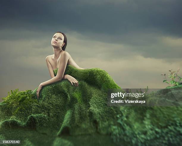 moss dress - woman dress grass stock pictures, royalty-free photos & images