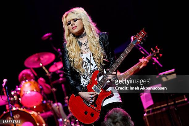 Musician Orianthi performs with the KLOS All Star Band at the 95.5 KLOS Christmas Show held at Nokia Theatre L.A. Live on December 13, 2012 in Los...