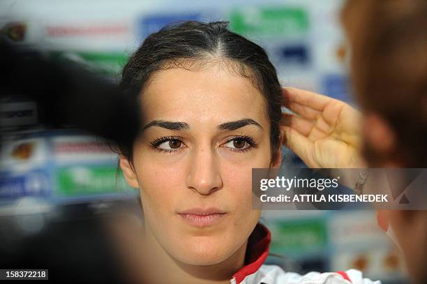 Serbia's Sanja Damnjanovic answer journalists during a media day of the 2012 EHF European Women's Handball Championship, on December 14 at the...