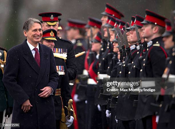 Secretary of State for Defence Philip Hammond inspects the Officer Cadets as he represents Queen Elizabeth II during the Sovereign's Parade at the...