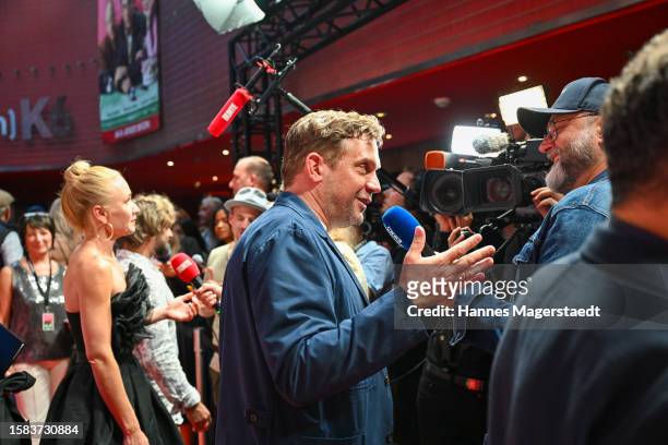 Sebastian Bezzel attends the Premiere for "Rehragout Rendezvous" at Mathaeser Filmpalast on July 31, 2023 in Munich, Germany.
