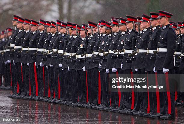 Officer Cadets take part in the Sovereign's Parade during heavy rain at the Royal Military Academy Sandhurst on December 14, 2012 in Sandhurst,...