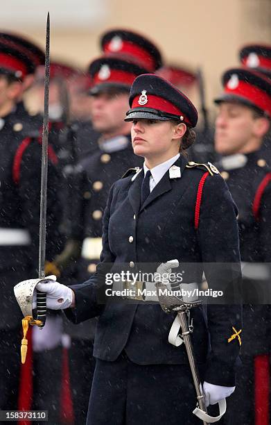 Sword of Honour winner Senior Under Officer Sarah Hunter-Choat holds the Sword of Honour as she takes part in the Sovereign's Parade at the Royal...