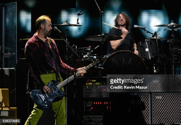 Krist Novoselic, Dave Grohl and Sir Paul McCartney perform at "12-12-12" a concert benefiting The Robin Hood Relief Fund to aid the victims of...