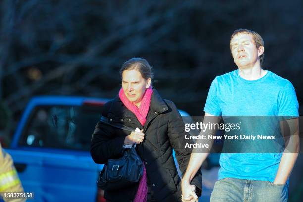 Robbie and Alyssa Parker outside firehouse at Sandy Hook Elementary School in Newtown, CT. The Parker's daughter, Emilie, was one of the 20 children...