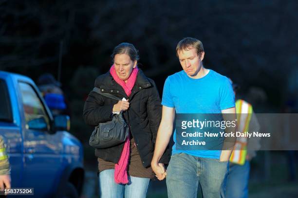 Robbie and Alyssa Parker outside firehouse at Sandy Hook Elementary School in Newtown, CT. The Parker's daughter, Emilie, was one of the 20 children...