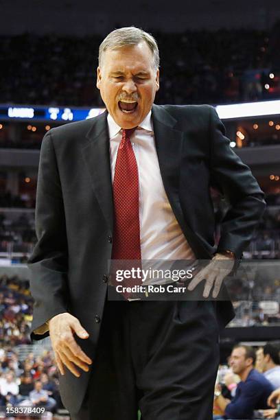 Head coach Mike D'Antoni of the Los Angeles Lakers reacts to a first half play against the Washington Wizards at Verizon Center on December 14, 2012...