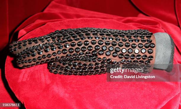 Glove worn by recording artist Michael Jackson is displayed at Nate D. Sanders media preview for Michael Jackson's 1980's iconic stage-worn items on...