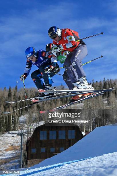 Jouni Pellinen of Finland, Mathieu Leduc of Canada and David Duncan of Canada battle for position during their eighth final heat in the Audi FIS Ski...