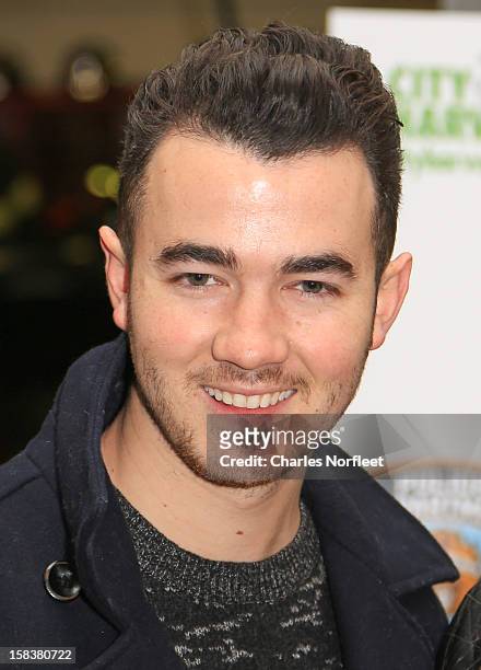 Kevin Jonas attends the City Harvest Holiday Season Food Drive at FDNY Station - Lexington & 3rd on December 14, 2012 in New York City.