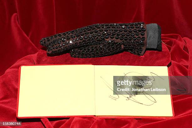 Glove worn by recording artist Michael Jackson is displayed at Nate D. Sanders Media Preview For Michael Jackson 1980's Iconic Stage-Worn Items on...