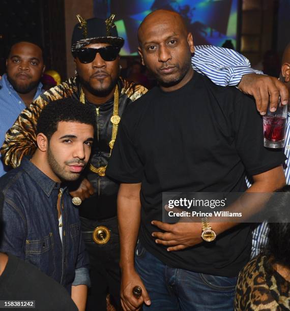 Drake, Young Jeezy and Alex Gidewon attend Young Jeezy's Mixtape Release party at Vanquish Lounge on December 13, 2012 in Atlanta, Georgia.