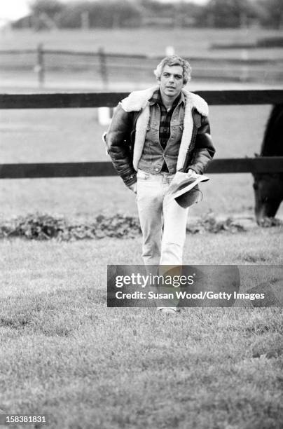 American fashion designer Ralph Lauren walks near his home, East Hampton in November 1977.