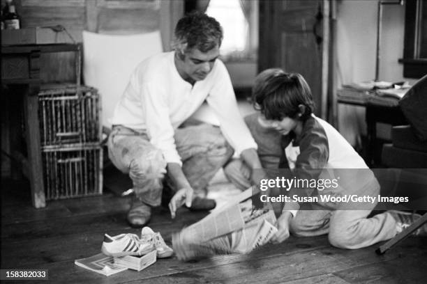 American fashion designer Ralph Lauren, with two of his three children , in their home, East Hampton, New York, November 1977.