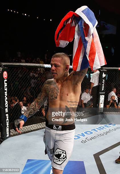 Ross Pearson reacts after his knockout victory over George Sotiropoulos during their lightweight fight at the UFC on FX event on December 15, 2012 at...