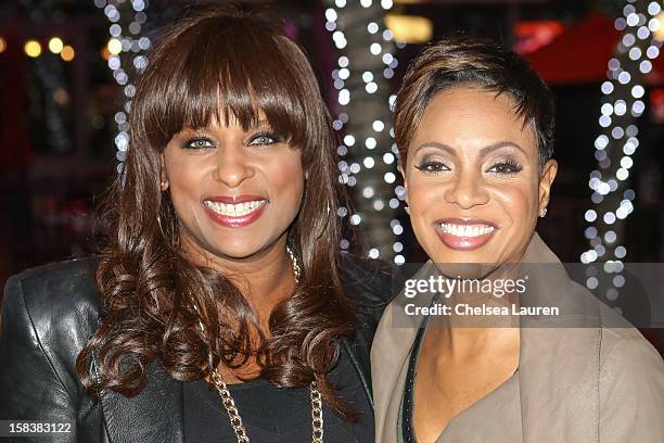 Rappers Yo-Yo and MC Lyte attend AEG's season of giving honoring YoYo School of Hip Hop at Nokia Plaza L.A. LIVE on December 14, 2012 in Los Angeles,...