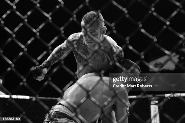 Ross Pearson punches George Sotiropoulos during the Lightweight bout between George Sotiropoulos and Ross Pearson at Gold Coast Convention and...