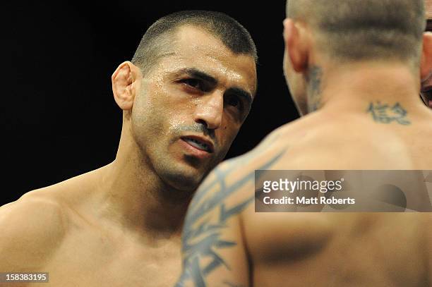 George Sotiropoulos stands in the octagon before the Lightweight bout between George Sotiropoulos and Ross Pearson at Gold Coast Convention and...