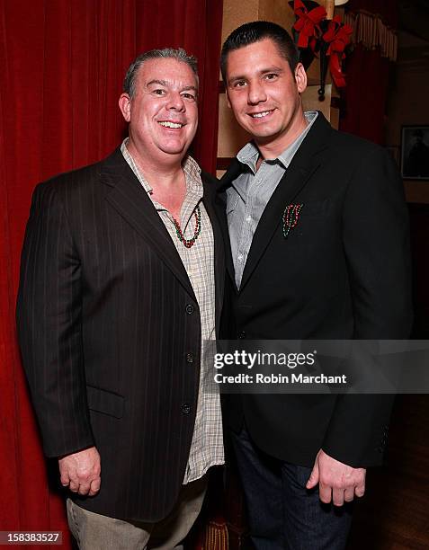 Elvis Duran and Alex Carr attend Elvis Duran Morning Show Holiday Party at Carmine's on December 14, 2012 in New York City.