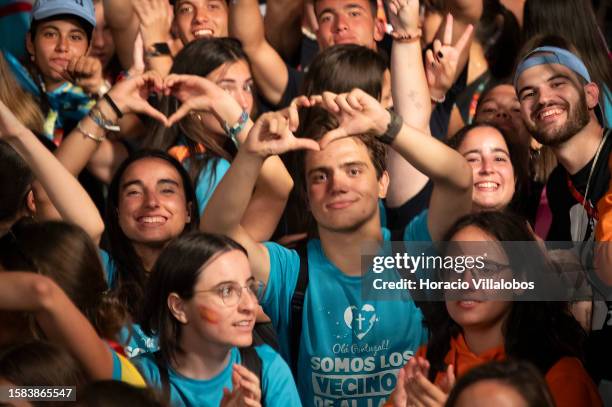 Pilgrims gather at Estoril Casino Gardens to celebrate with a rock concert on the eve of JMJ-WYD on July 31, 2023 in Estoril, Portugal. Lisbon hosts...