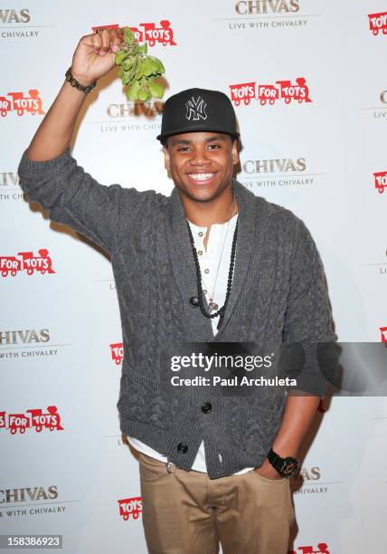 Actor Tristan Wilds attends the "Under The Mistletoe" charity event benefiting the Toys For Tots Foundation at the Lexington Social House on December...
