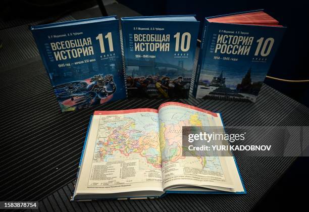 An administrative map of Russia is seen on pages of a new schoolbook for high school students on general world history and Russian history,...