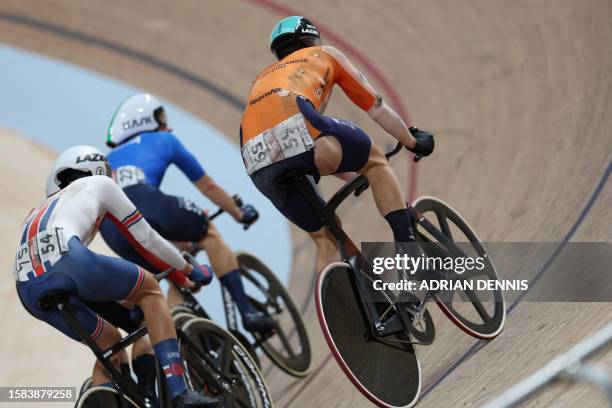 The ripped clothing of Netherlands' Matthijs Buchli is seem after the men's Elite Elimination race during the UCI Cycling World Championships in...
