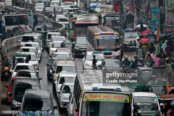 Vehicles are trapped in a traffic jam in Dhaka, Bangladesh on August 7, 2023. Over the past decade in Dhaka, the average speed of traffic has...